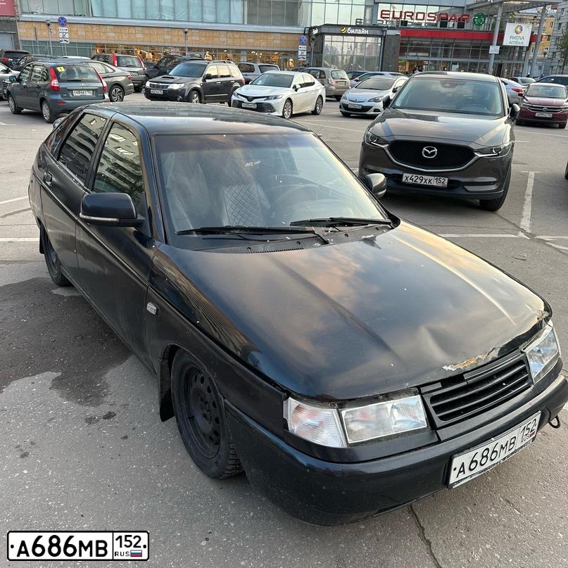 Фото автомобиля LADA 2112, 2005 — госномер А241ТМ252. Цвет: ЧЕРНЫЙ