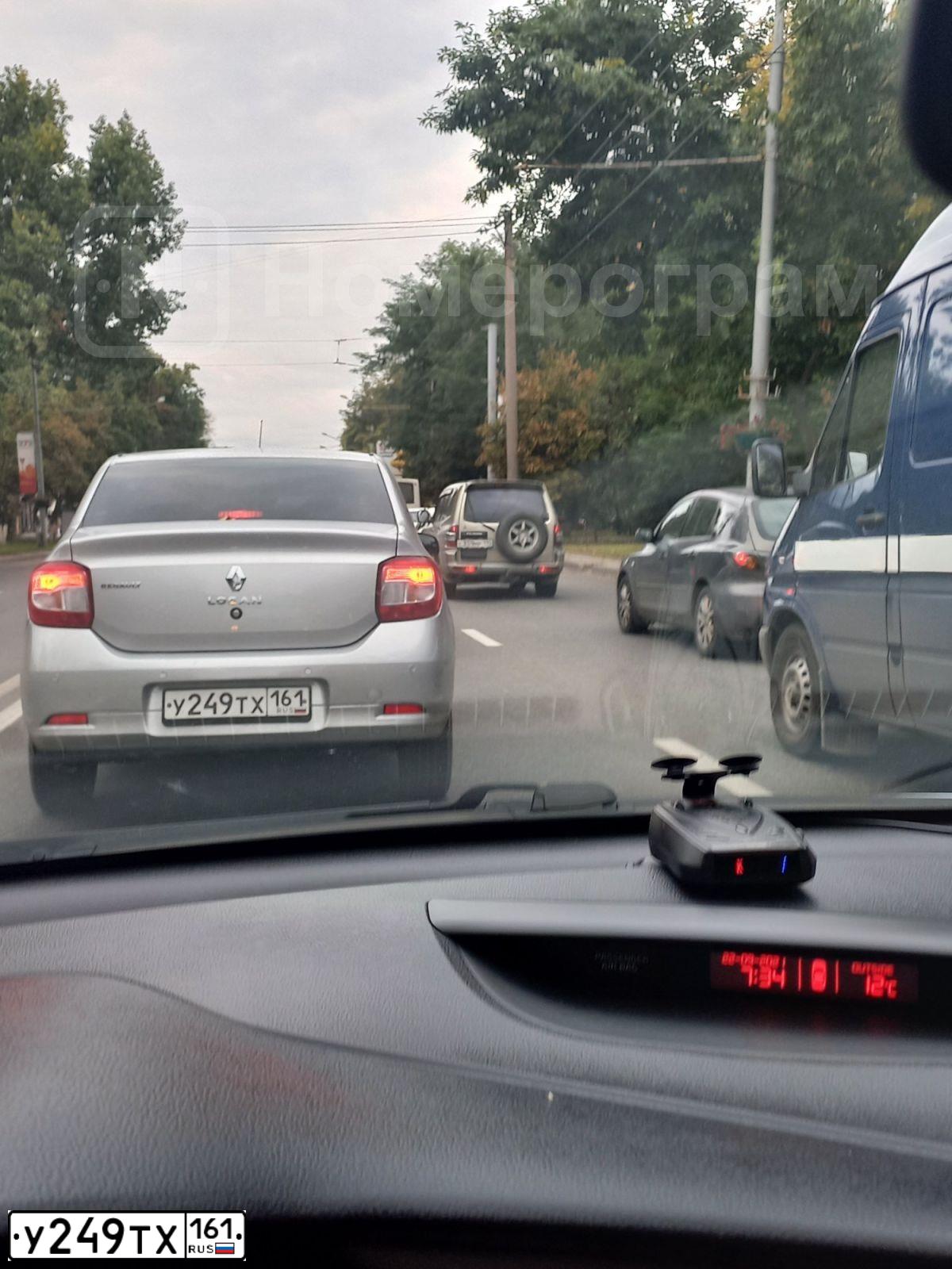 Фото автомобиля RENAULT LOGAN, 2016 — госномер У249ТХ161. Цвет: СВЕТЛО-СЕРЫЙ