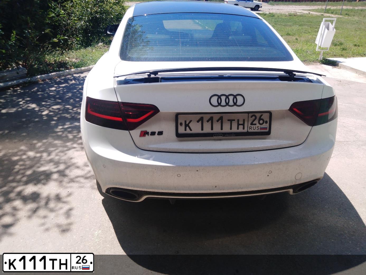 Фото автомобиля AUDI A7, 2012 — госномер К111ТН26. Цвет: ЧЕРНЫЙ