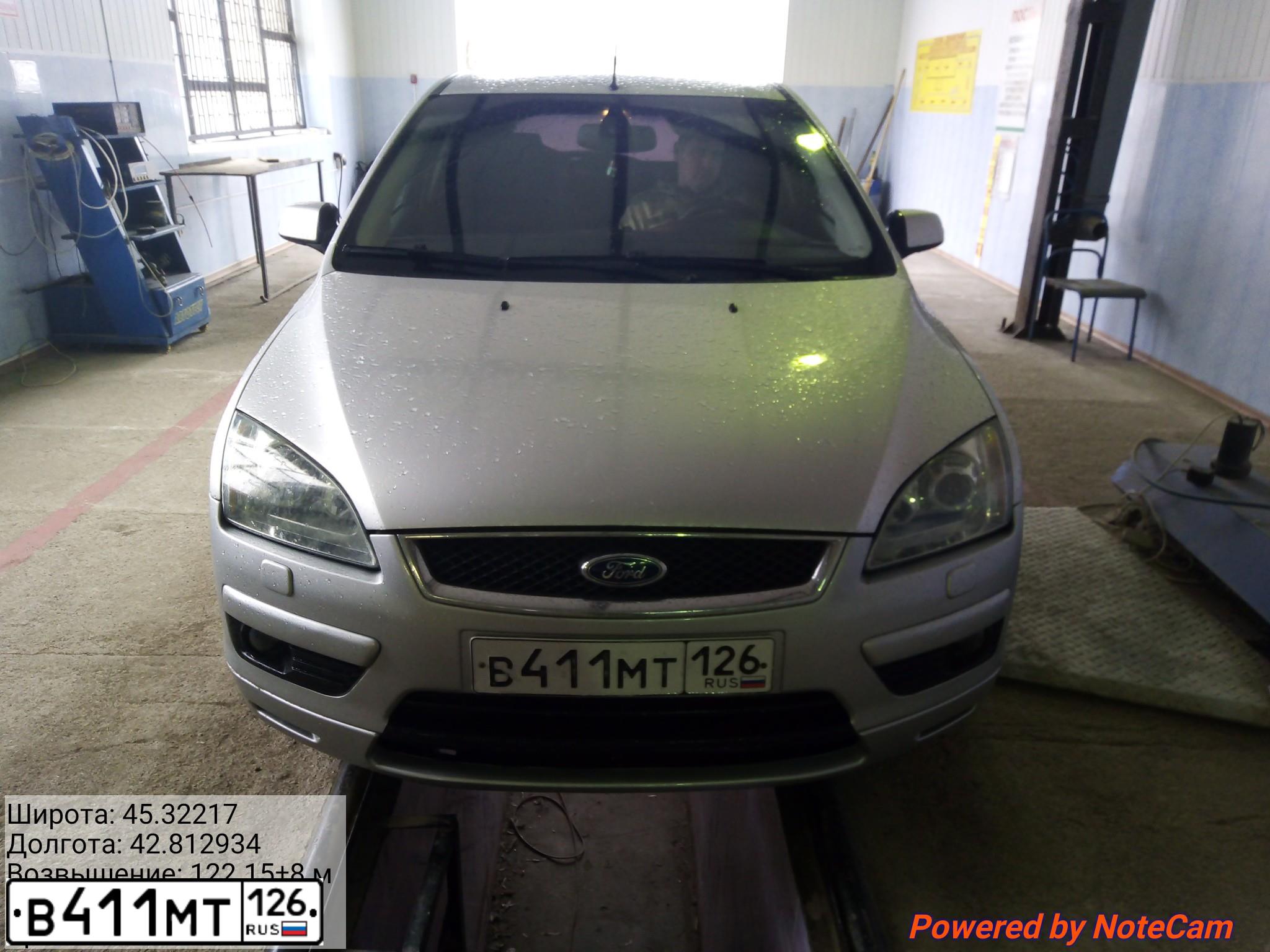 Фото автомобиля FORD FOCUS, 2006 — госномер В411МТ126. Цвет: Серебристый