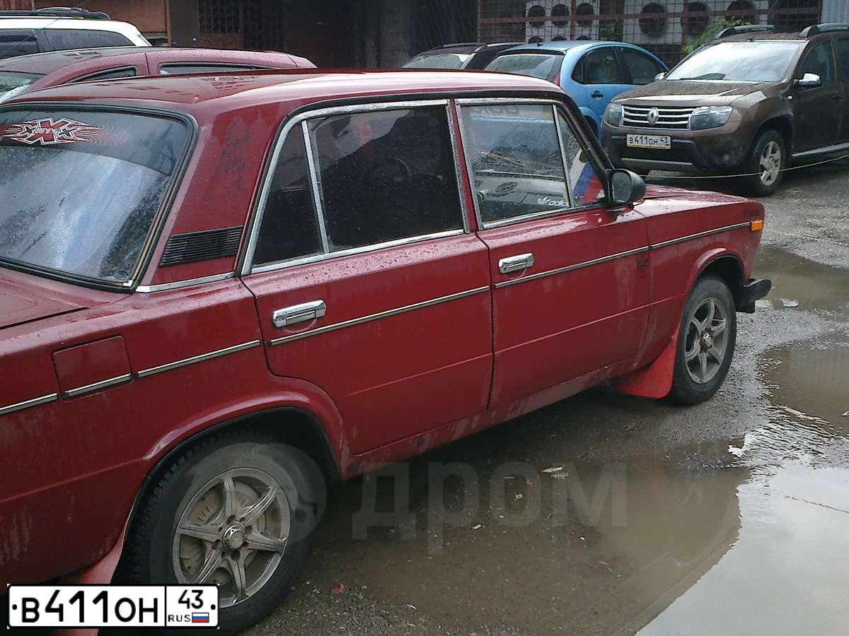 Фото автомобиля RENAULT DUSTER, 2013 — госномер В411ОН43. Цвет: КОРИЧНЕВЫЙ