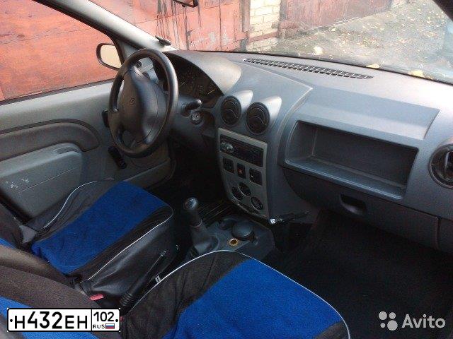 Фото автомобиля RENAULT LOGAN, 2009 — госномер Е266ТР174. Цвет: ТЕМНО-СЕРЫЙ