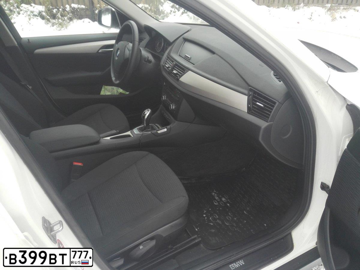 Фото автомобиля BMW X1, 2013 — госномер Н793ТК32. Цвет: Белый