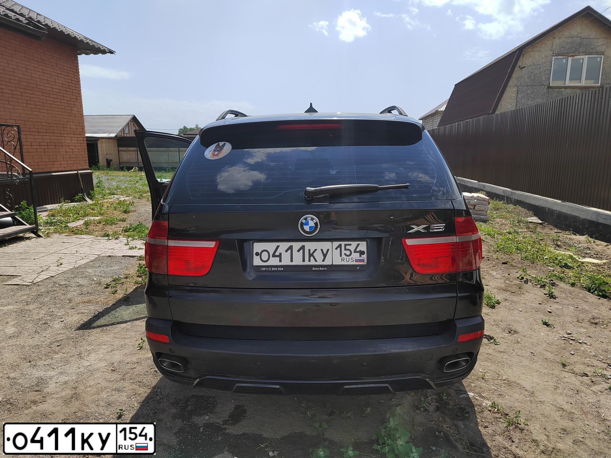 Фото автомобиля BMW X5, 2007 — госномер О411КУ154. Цвет: ЧЕРНЫЙ