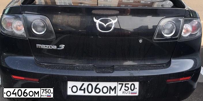 Фото автомобиля MAZDA 3, 2008 — госномер О406ОМ750. Цвет: ЧЕРНЫЙ