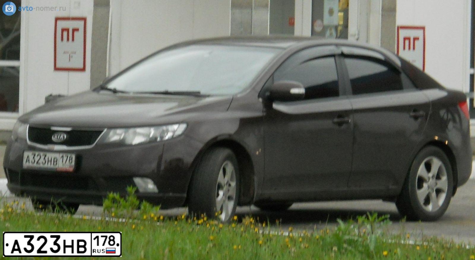 Фото автомобиля KIA CERATO, 2010 — госномер А323НВ178. Цвет: КРАСНЫЙ