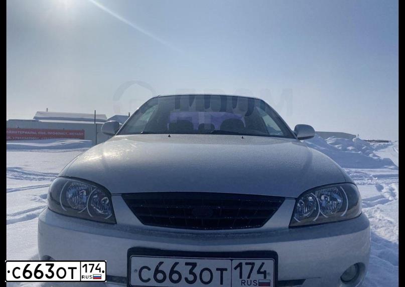 Фото автомобиля KIA SPECTRA, 2006 — госномер С663ОТ174. Цвет: Серебристый