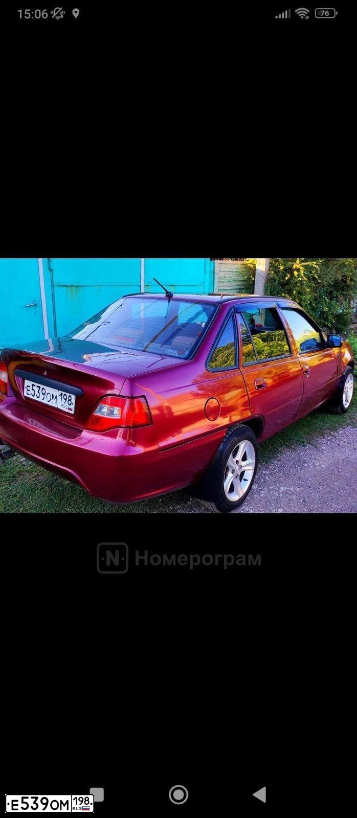 Фото автомобиля DAEWOO NEXIA, 2012 — госномер Е539ОМ198. Цвет: СПЕЛАЯ ВИШНЯ