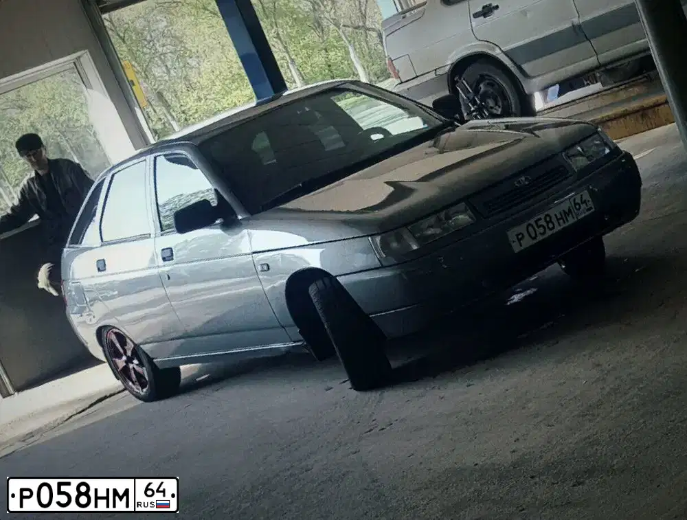 Фото автомобиля LADA 2112, 2008 — госномер Р058НМ64. Цвет: СРЕДНИЙ СЕРО-ЗЕЛЕНЫЙ МЕТ.
