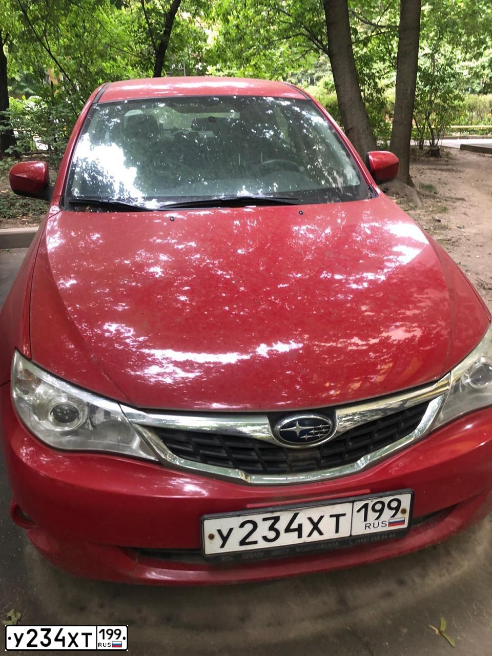 Фото автомобиля SUBARU IMPREZA, 2009 — госномер У234ХТ199. Цвет: Красный