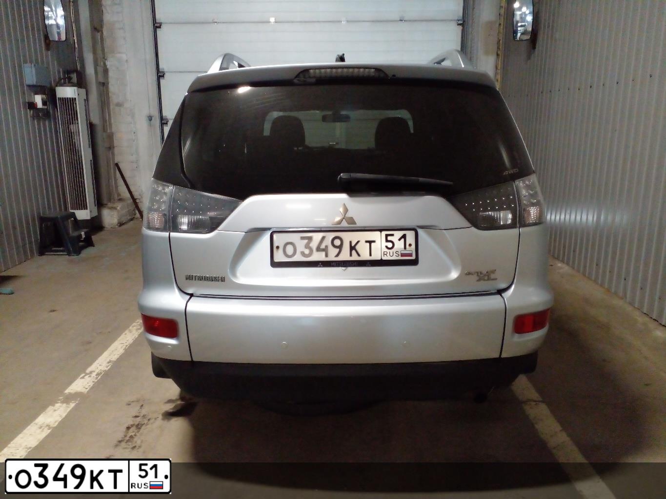 Фото автомобиля MITSUBISHI OUTLANDER, 2010 — госномер О349КТ51. Цвет: СЕРЕБРИСТЫЙ