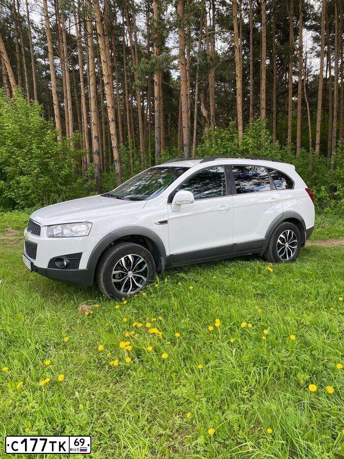 Фото автомобиля CHEVROLET CAPTIVA, 2012 — госномер А247СО69. Цвет: Белый