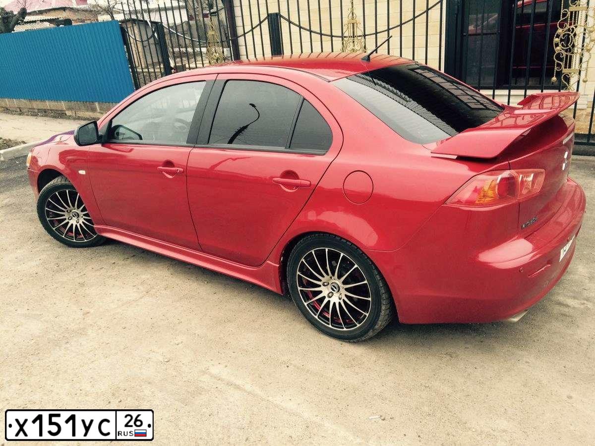 Фото автомобиля MITSUBISHI LANCER, 2007 — госномер Р385РУ123. Цвет: Красный