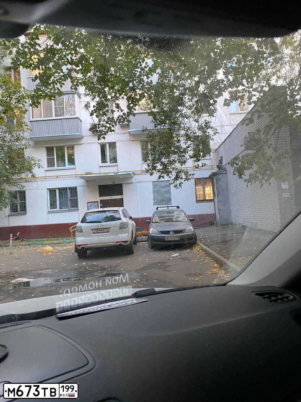 Фото автомобиля MITSUBISHI LANCER, 2006 — госномер М673ТВ199. Цвет: СЕРЫЙ