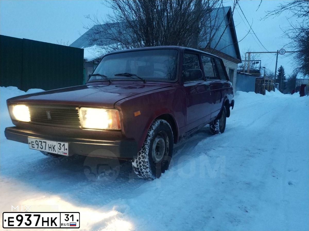 Фото автомобиля LADA 2104, 2002 — госномер Р150ТА46. Цвет: ЯРКО-ФИОЛЕТОВЫЙ