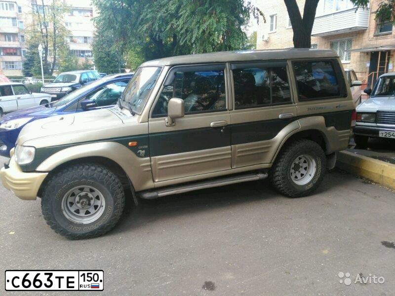 Фото автомобиля HYUNDAI GALLOPER, 2002 — госномер С663ТЕ150. Цвет: Зеленый Серый