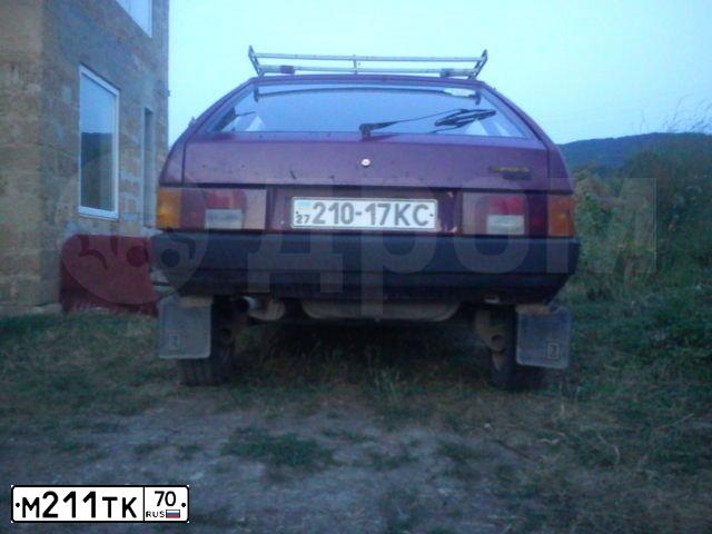 Фото автомобиля LADA 2106, 2002 — госномер М211ТХ70. Цвет: ТЕМНО-СИНИЙ