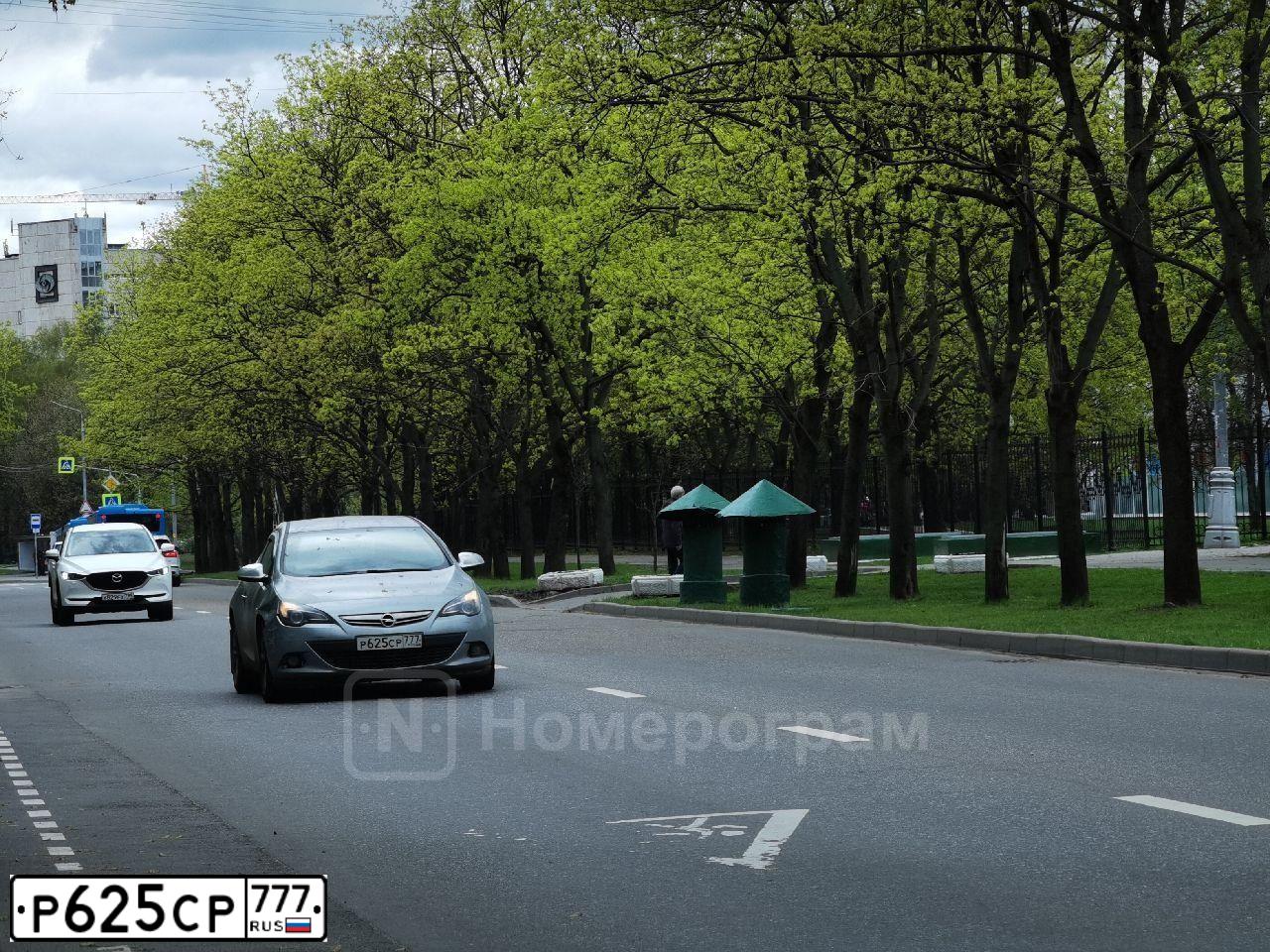 Фото автомобиля OPEL ASTRA, 2012 — госномер Р900ОН48. Цвет: СЕРЫЙ