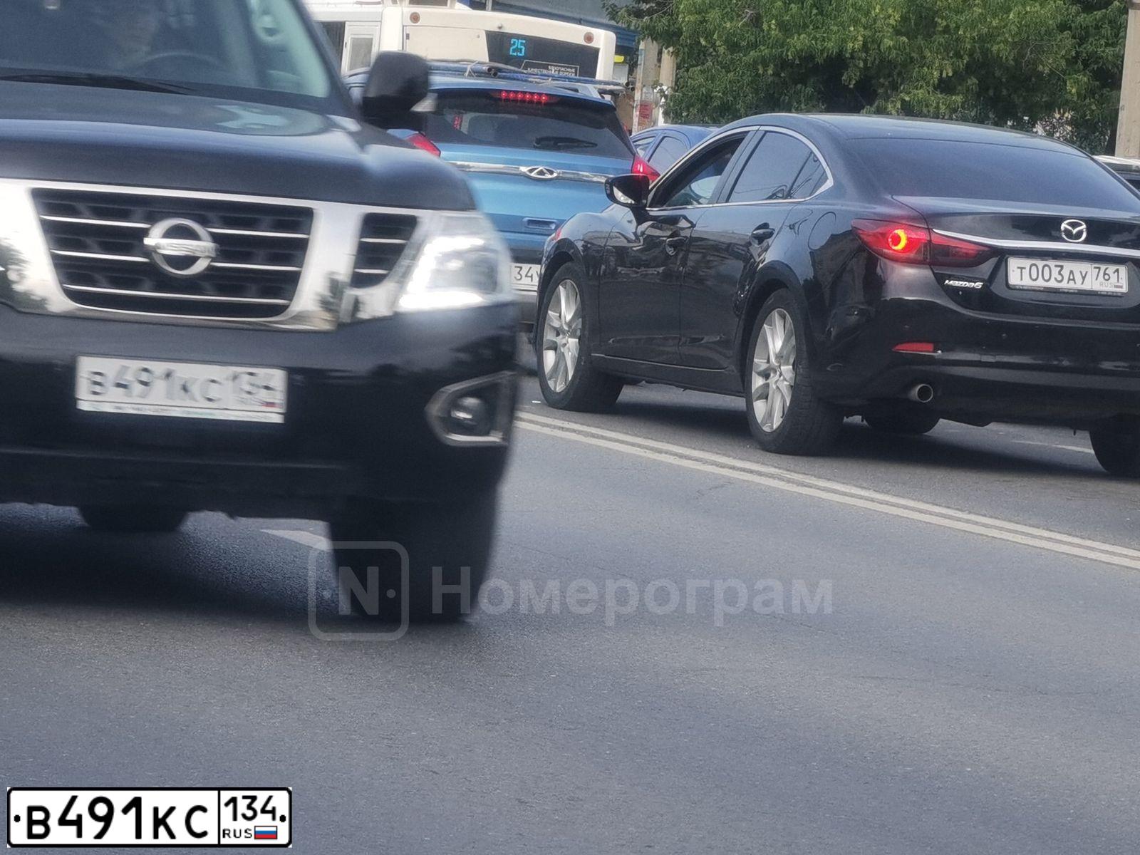 Фото автомобиля NISSAN PATROL, 2014 — госномер В491КС134. Цвет: ЧЕРНЫЙ