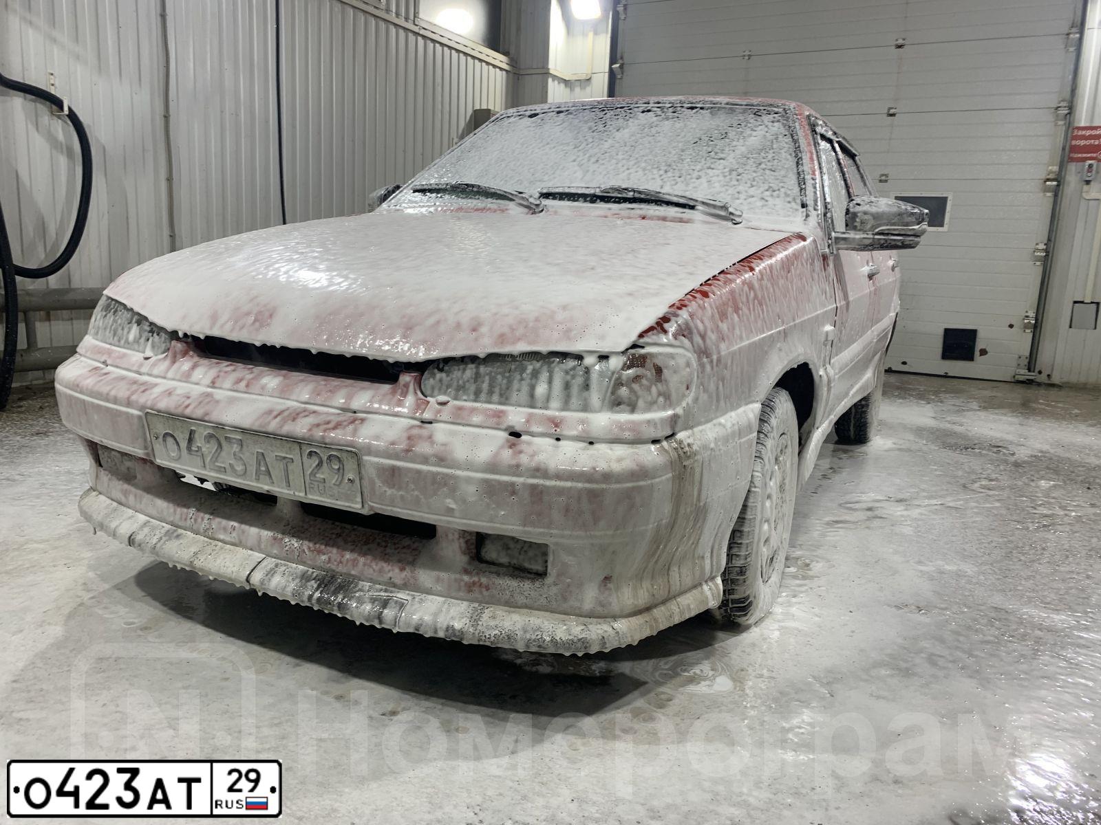 Фото автомобиля LADA 2115 SAMARA, 2005 — госномер Е643РУ29. Цвет: Оранжевый