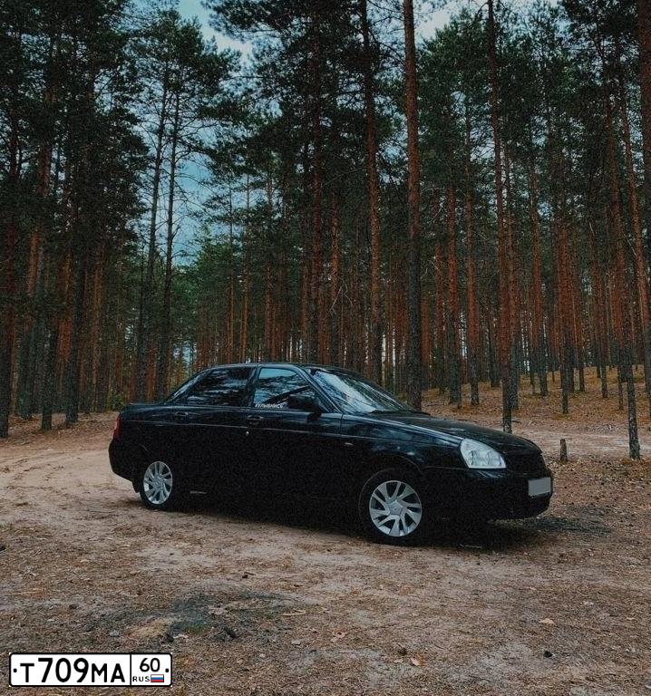 Фото автомобиля LADA 2170 PRIORA, 2009 — госномер Т709МА60. Цвет: ЧЕРНО-СИНИЙ