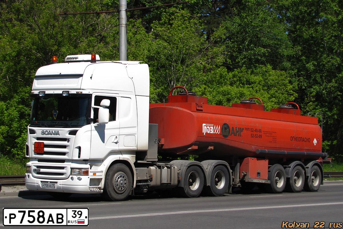 Фото автомобиля SCANIA SERIE R /6X4/, 2013 — госномер Р574НЕ27. Цвет: Белый