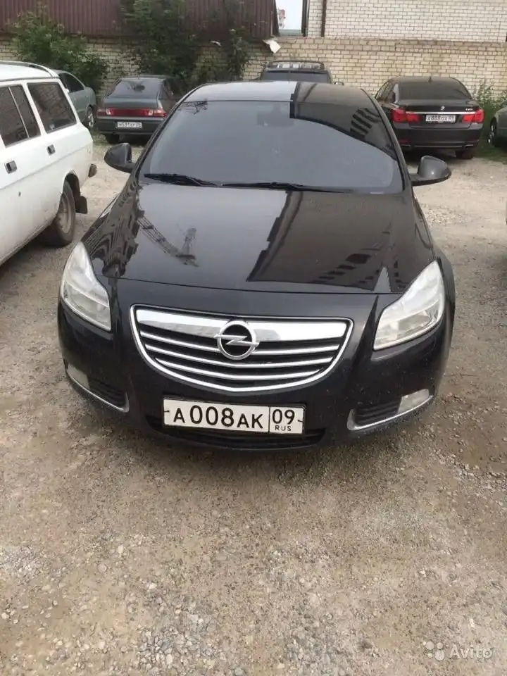 Фото автомобиля HYUNDAI SOLARIS, 2015 — госномер А006АК09. Цвет: ТЕМНО-СЕРЫЙ