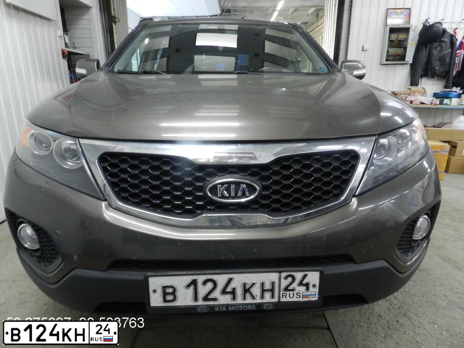 Фото автомобиля KIA SORENTO, 2010 — госномер Е471ВО190. Цвет: Коричневый