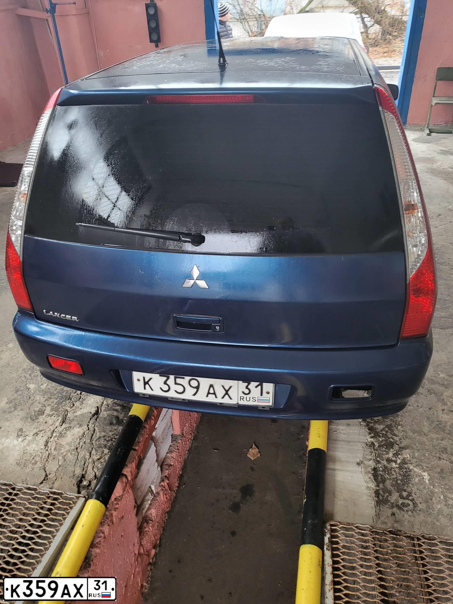 Фото автомобиля MITSUBISHI LANCER, 2006 — госномер К359АХ31. Цвет: синий
