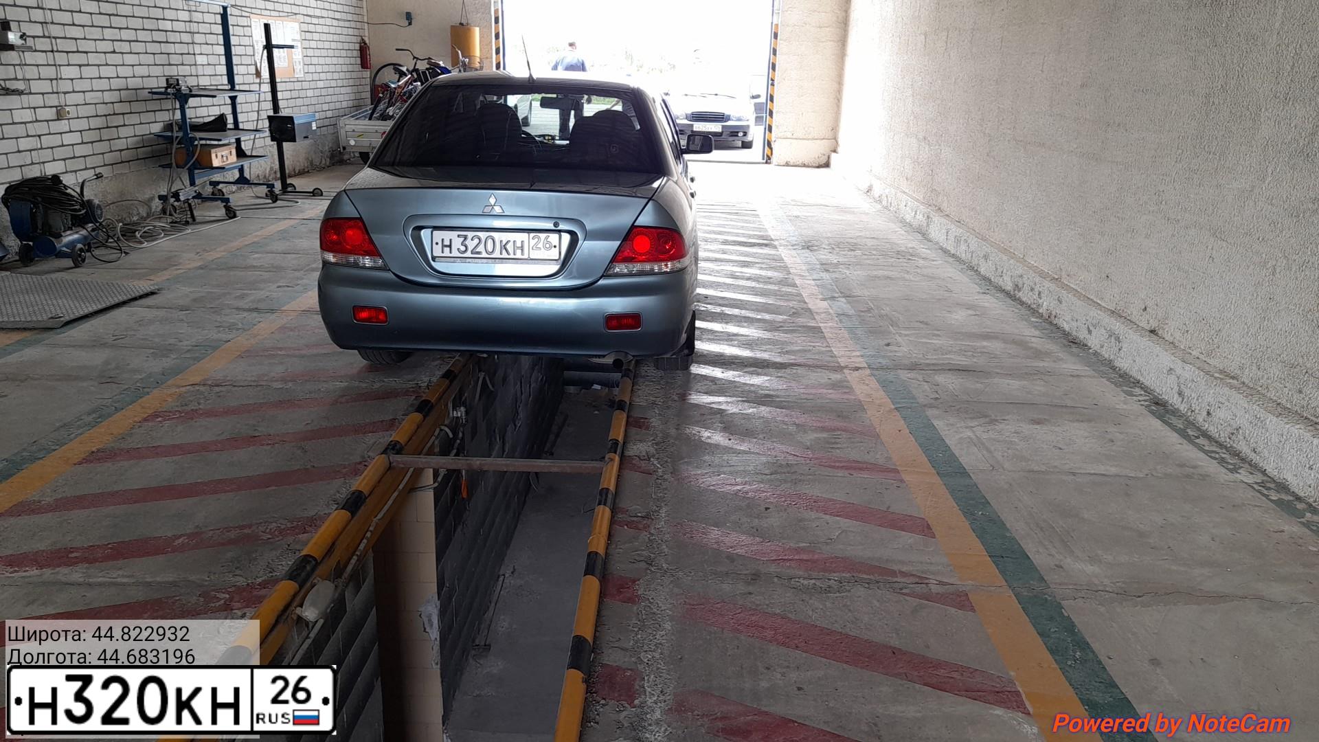 Фото автомобиля LADA 2107, 2005 — госномер Н320КА26. Цвет: Темно-зеленый