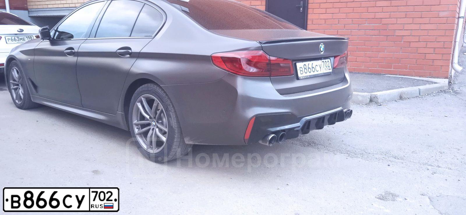 Фото автомобиля BMW SERIE 5, 2018 — госномер К215ЕС774. Цвет: ЧЕРНЫЙ