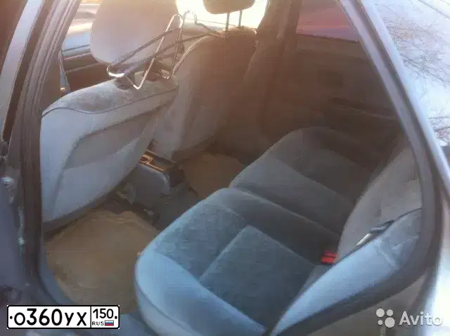 Фото автомобиля RENAULT LAGUNA, 1996 — госномер О360УХ150. Цвет: Белый