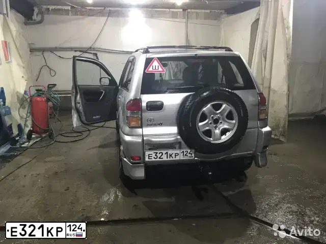 Фото автомобиля TOYOTA RAV4, 2001 — госномер Н052ОВ70. Цвет: Серый
