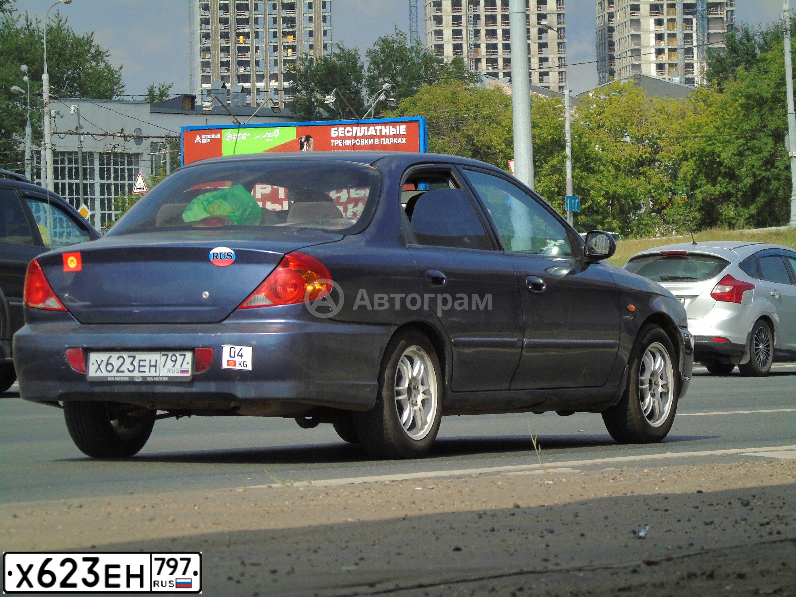 Фото автомобиля KIA SPECTRA, 2006 — госномер Х623ЕН797. Цвет: МЕРЦАЮЩИЙ СИНИЙ