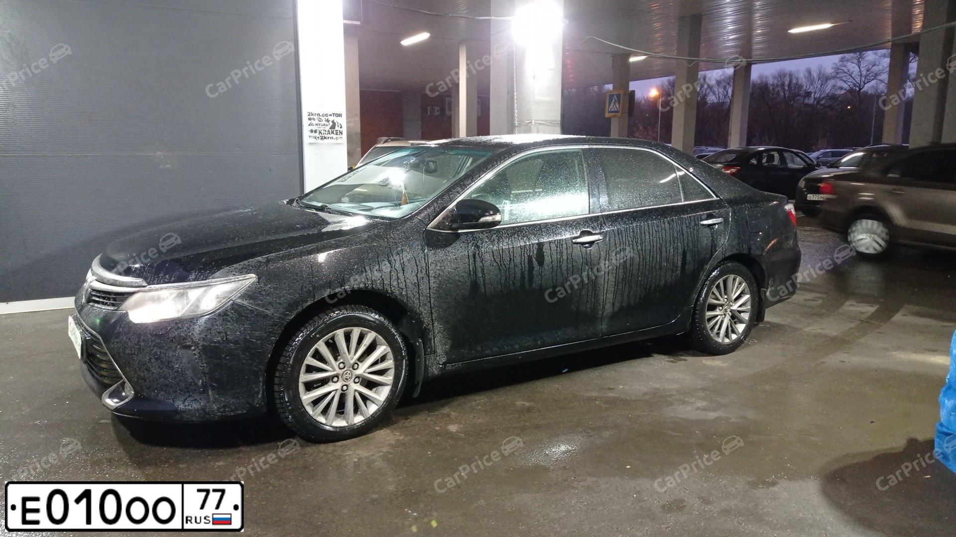 Фото автомобиля GAZ 3102 WOLGA, 2001 — госномер Е010ОО77. Цвет: ЧЕРНЫЙ