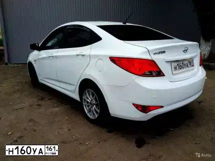 Фото автомобиля HYUNDAI SOLARIS, 2014 — госномер Н160УА161. Цвет: Белый