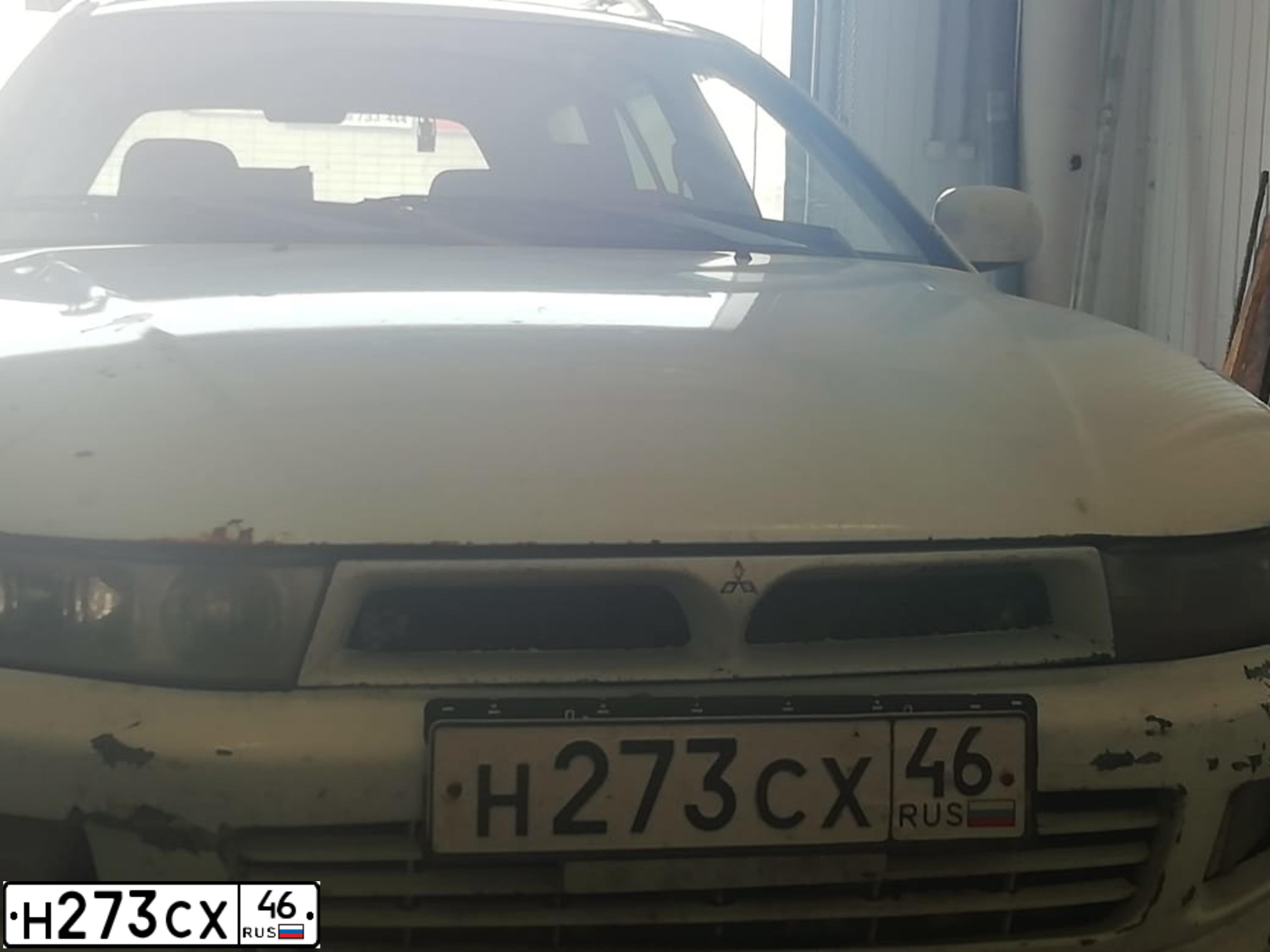 Фото автомобиля MITSUBISHI GALANT, 1997 — госномер Н273СХ46. Цвет: Белый