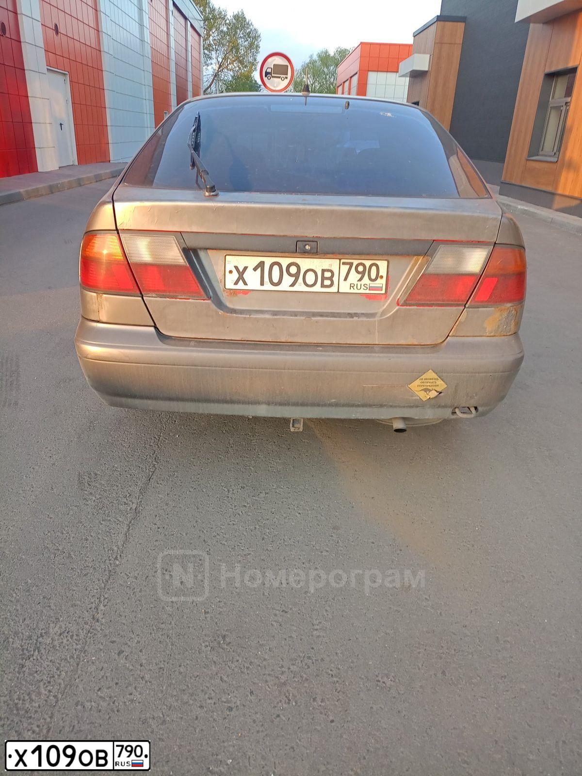 Фото автомобиля NISSAN PRIMERA, 1998 — госномер Х109ОВ790. Цвет: СЕРЫЙ