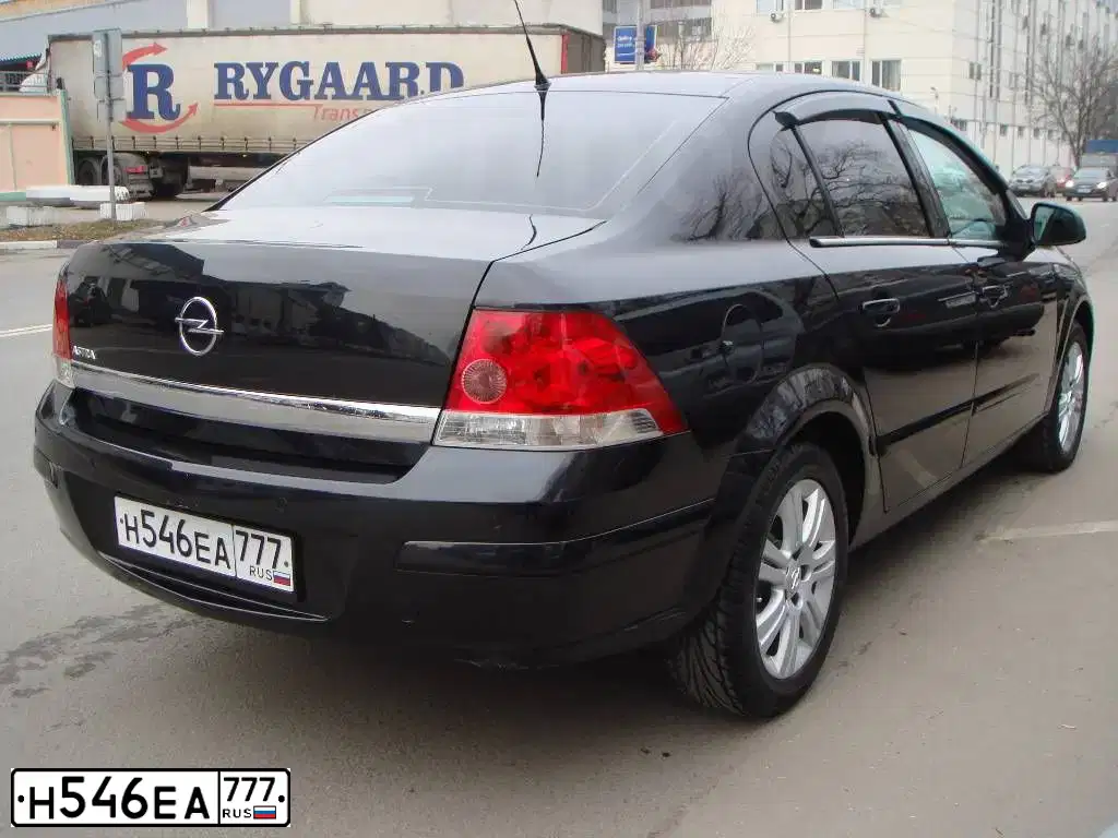 Фото автомобиля CHEVROLET AVEO, 2009 — госномер М567ТС36. Цвет: ЧЕРНЫЙ