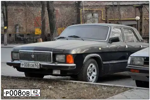 Фото автомобиля GAZ 3102 WOLGA, 2000 — госномер Р008ОВ62. Цвет: ЧЕРНЫЙ