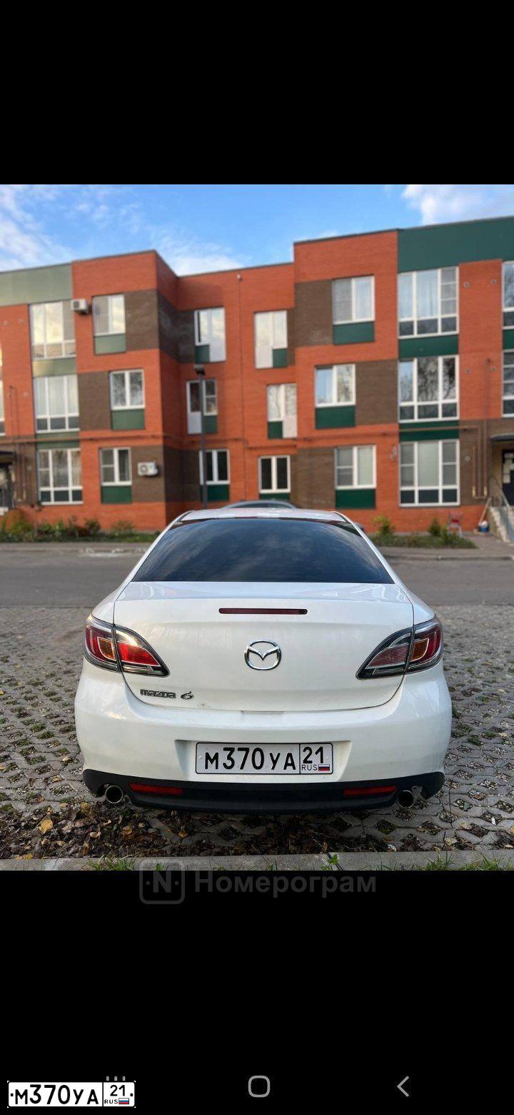 Фото автомобиля MAZDA 6, 2010 — госномер Х894НМ05. Цвет: Белый