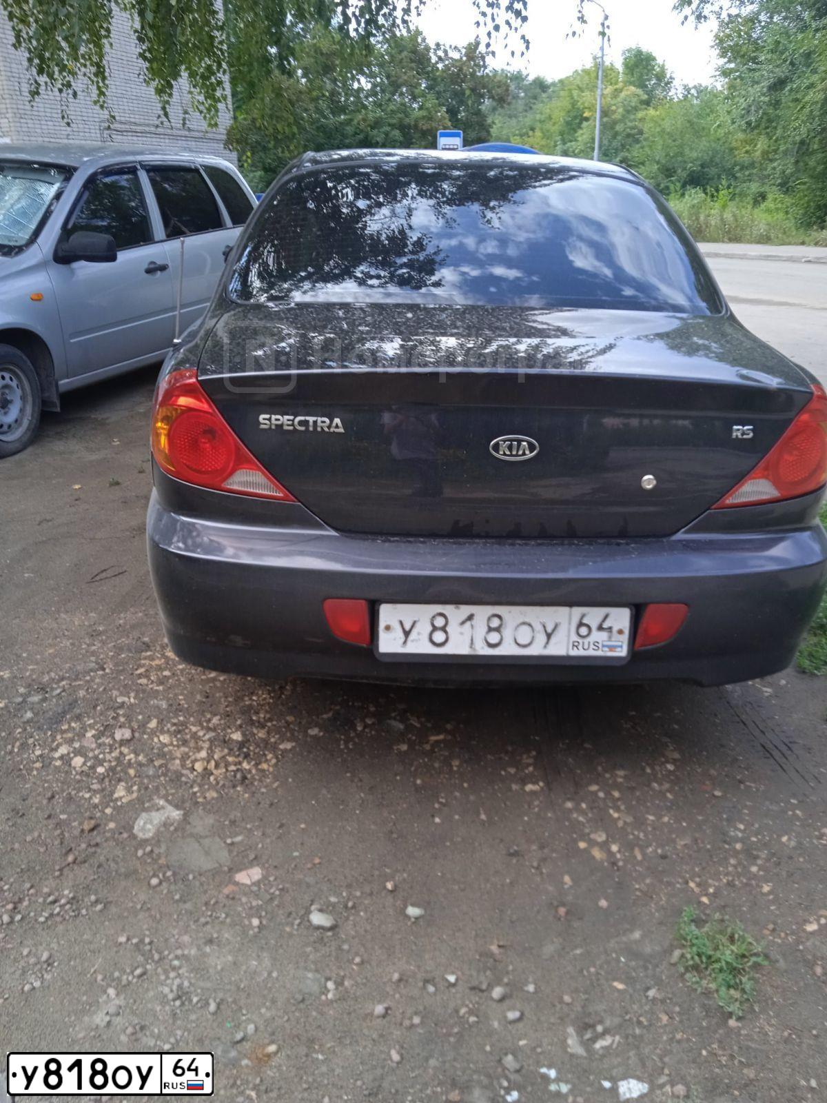 Фото автомобиля KIA SPECTRA, 2008 — госномер Р609ЕК64. Цвет: ЧЕРНЫЙ ЖЕМЧУГ