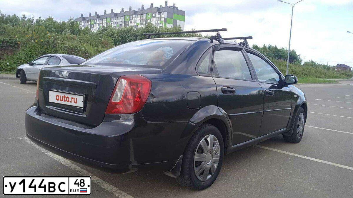 Фото автомобиля CHEVROLET T LACETTI, 2009 — госномер Е797НУ797. Цвет: ЧЕРНЫЙ