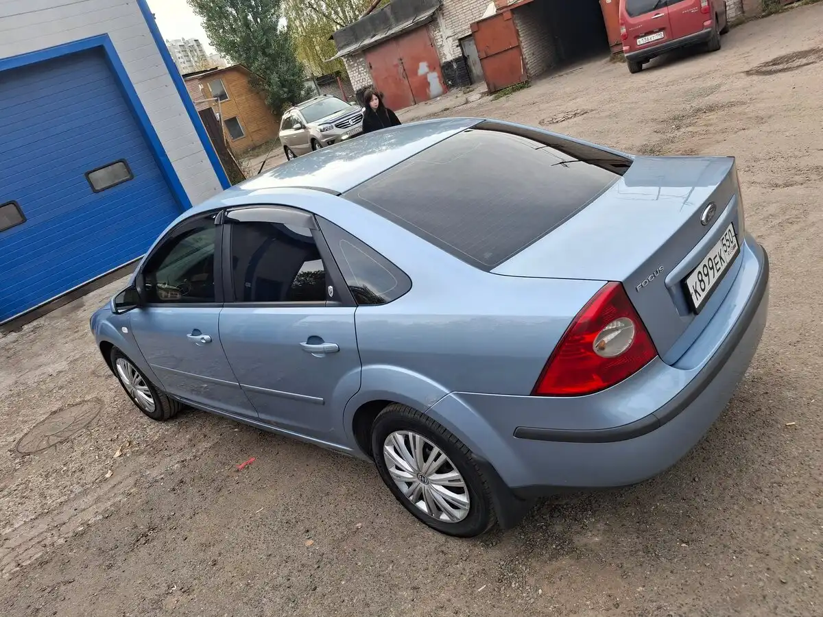 Фото автомобиля FORD FOCUS, 2006 — госномер Н159ЕС177. Цвет: Серо-голубой