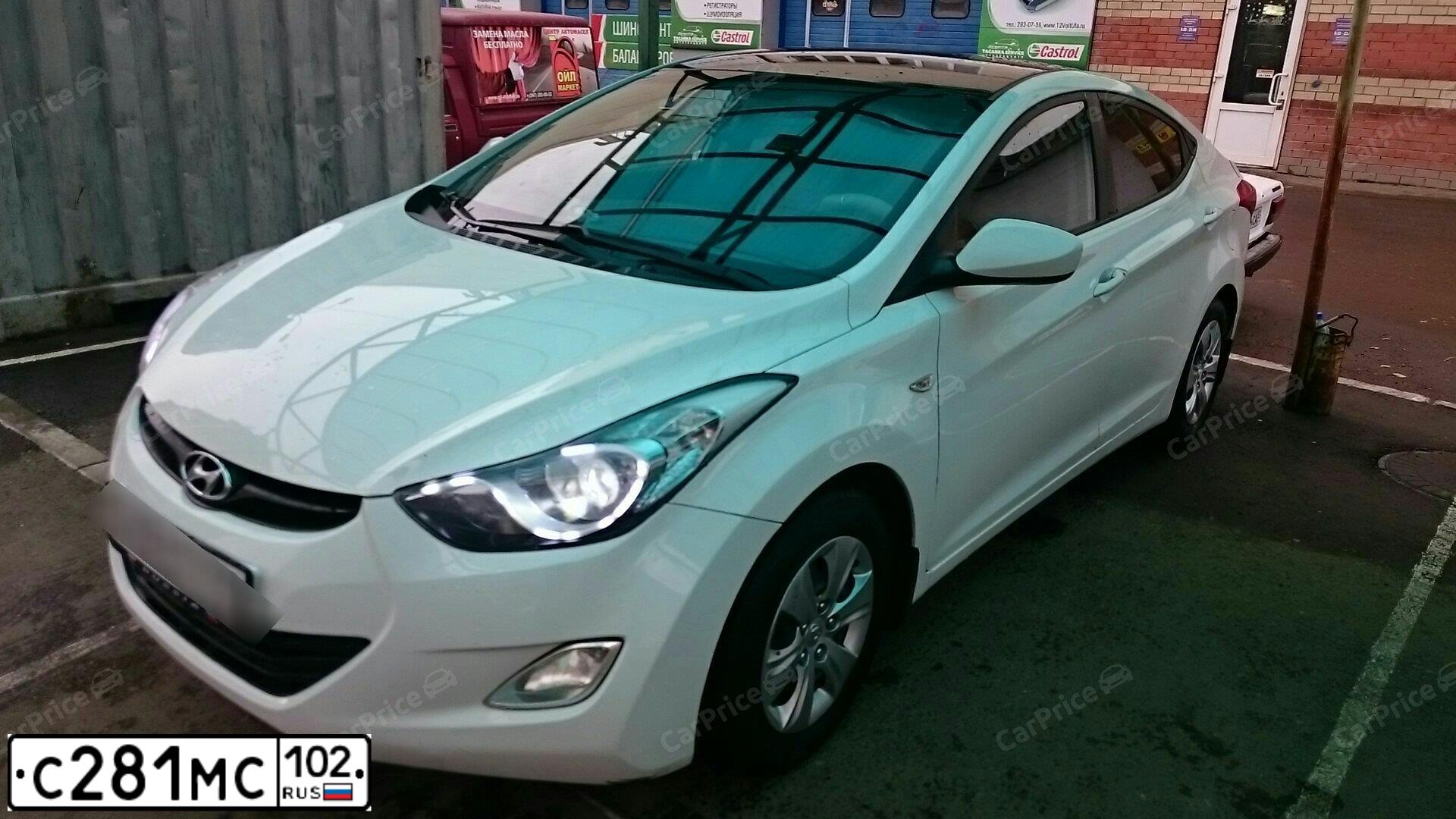 Фото автомобиля HYUNDAI ELANTRA 1.6 MT, 2013 — госномер Н213ММ702. Цвет: БЕЛЫЙ