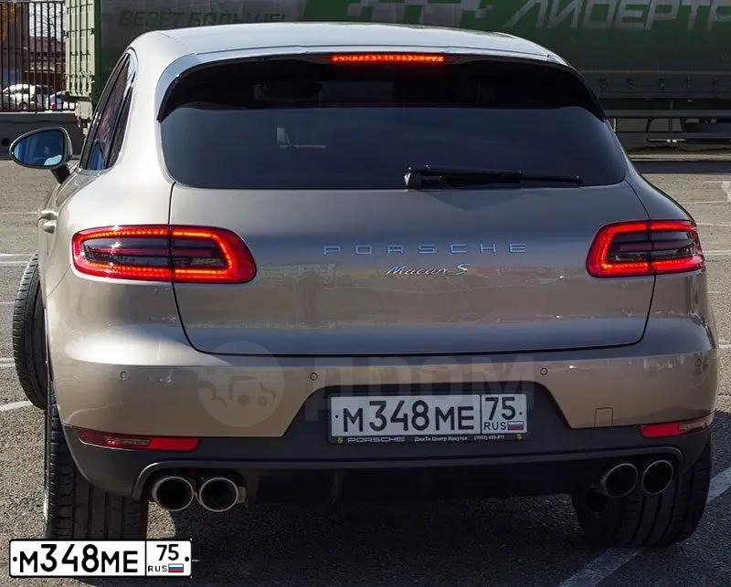 Фото автомобиля PORSCHE MACAN, 2015 — госномер Е157НЕ147. Цвет: СВЕТЛО-КОРИЧНЕВЫЙ