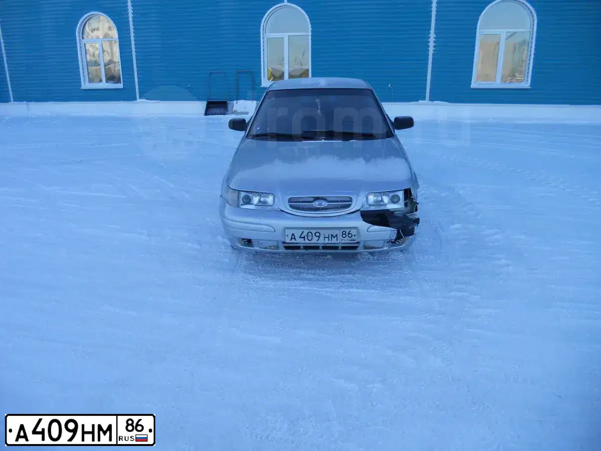 Фото автомобиля LADA 2110, 2004 — госномер А409НМ86. Цвет: СВЕТЛО-СЕРЕБРИСТЫЙ МЕТАЛЛ