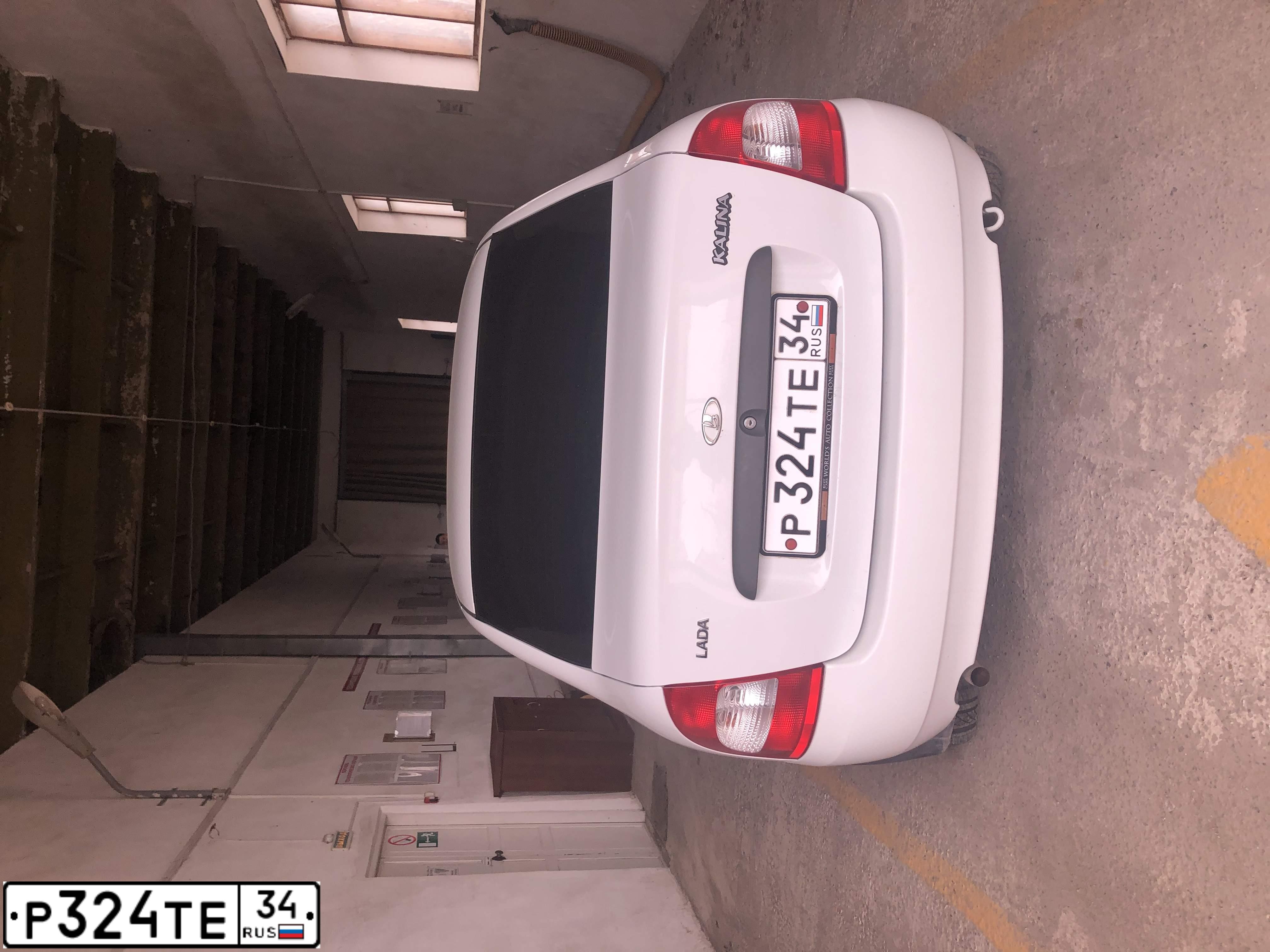 Фото автомобиля LADA 1118 KALINA, 2011 — госномер Р324ТЕ34. Цвет: БЕЛЫЙ