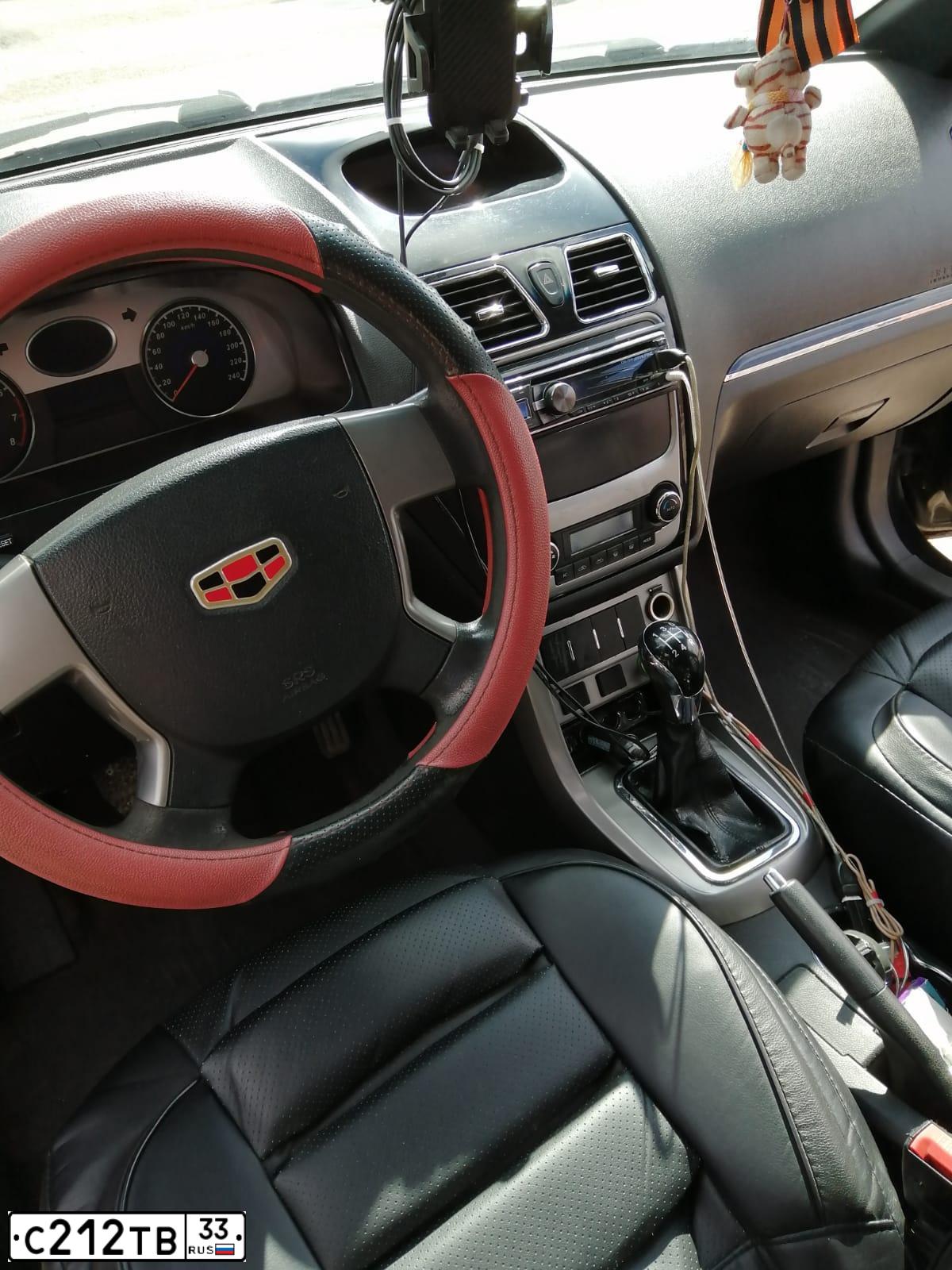 Фото автомобиля GEELY Y EMGRAND, 2014 — госномер С212ТВ33. Цвет: ЖЕЛТЫЙ