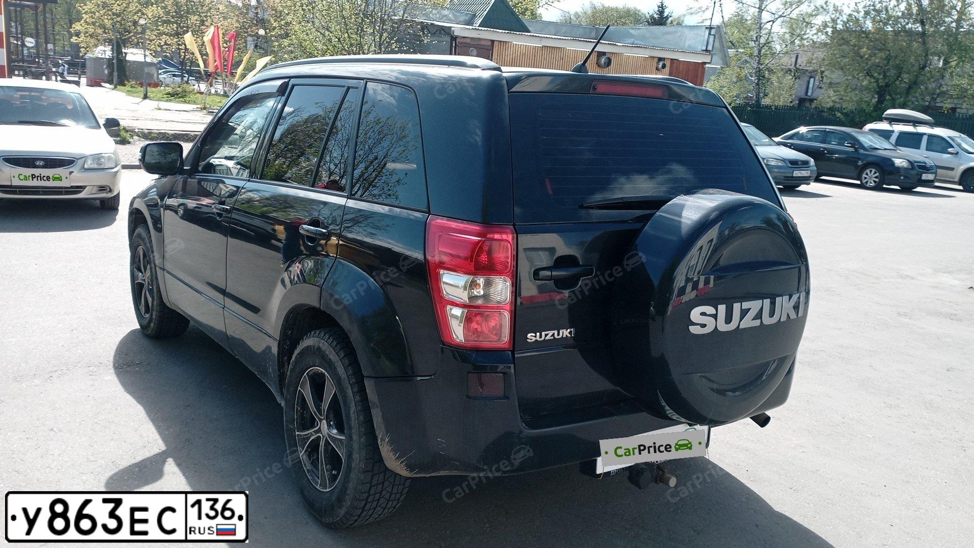Фото автомобиля SUZUKI /GRAND/ VITARA, 2010 — госномер Х180РР790. Цвет: ЧЕРНЫЙ